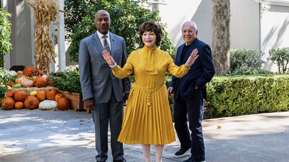 UC Davis Chancellor Gary S. May and philanthropists Lynda and Stewart Resnick pose for a picture at the chancellor’s residence in Davis last month after the announcement of a $50 million donation, the largest in campus history.