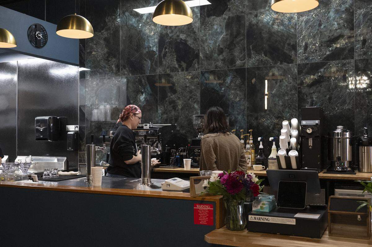 Employees practice making drinks at Sweet Music Studio Cafe in Citrus Heights on Wednesday, Jan. 21, 2026, in preparation for the cafe’s opening on Friday.