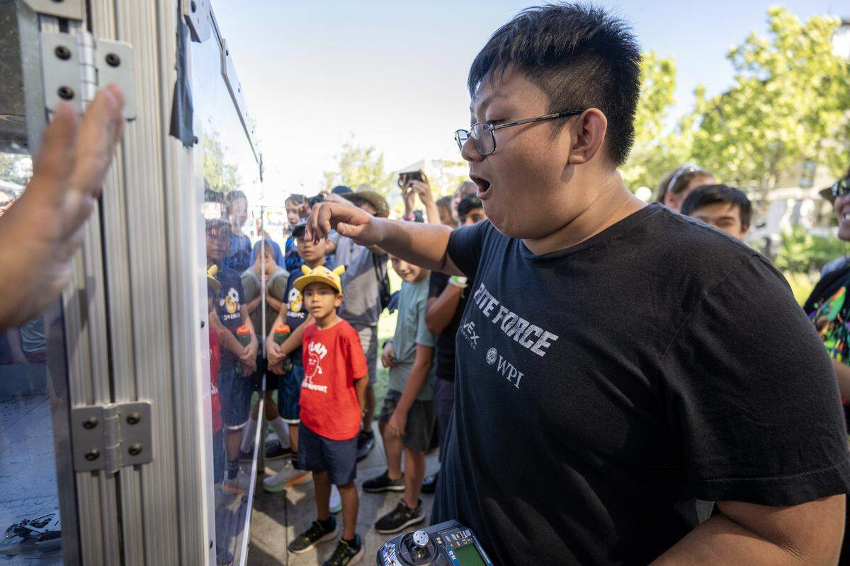 Andy Nguyen, a student at Benicia High School, celebrates Saturday in Roseville after winning his first match. 