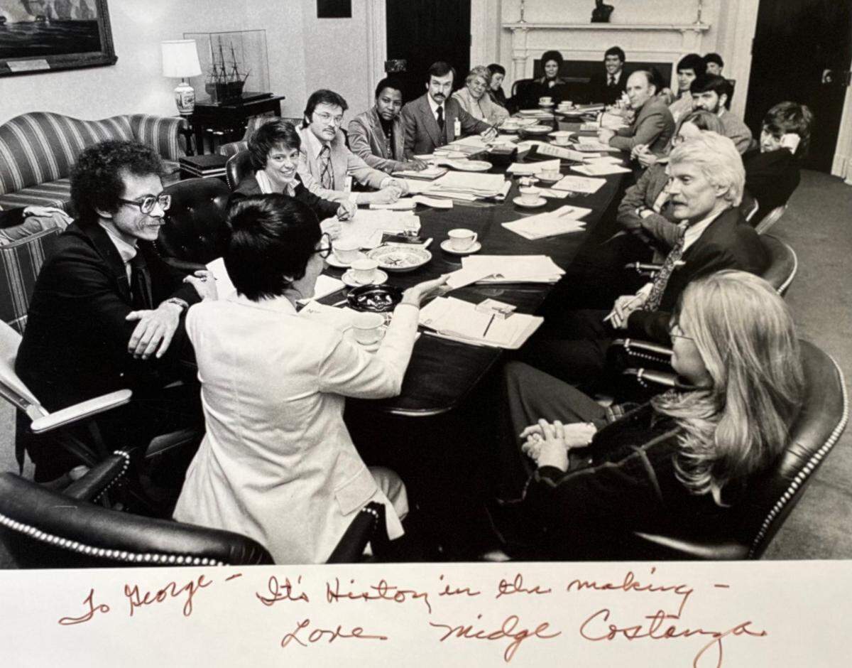 Attendees at the 1977 National Gay Task Force meeting at the White House. Clockwise from center: Midge Costanza, Robert Maulsom, Jean O’Leary, William Kelley, Betty Powell, Charles Brydon, Charlotte Spitzer, Myra Riddell, Cooki Lutkefedder, Ray Hartman, Pokey Anderson, George Raya, Frank Kameny, Reverend Troy Perry, Charlotte Bunch, Elaine Noble, Bruce Voeller, and Marilyn Haft.