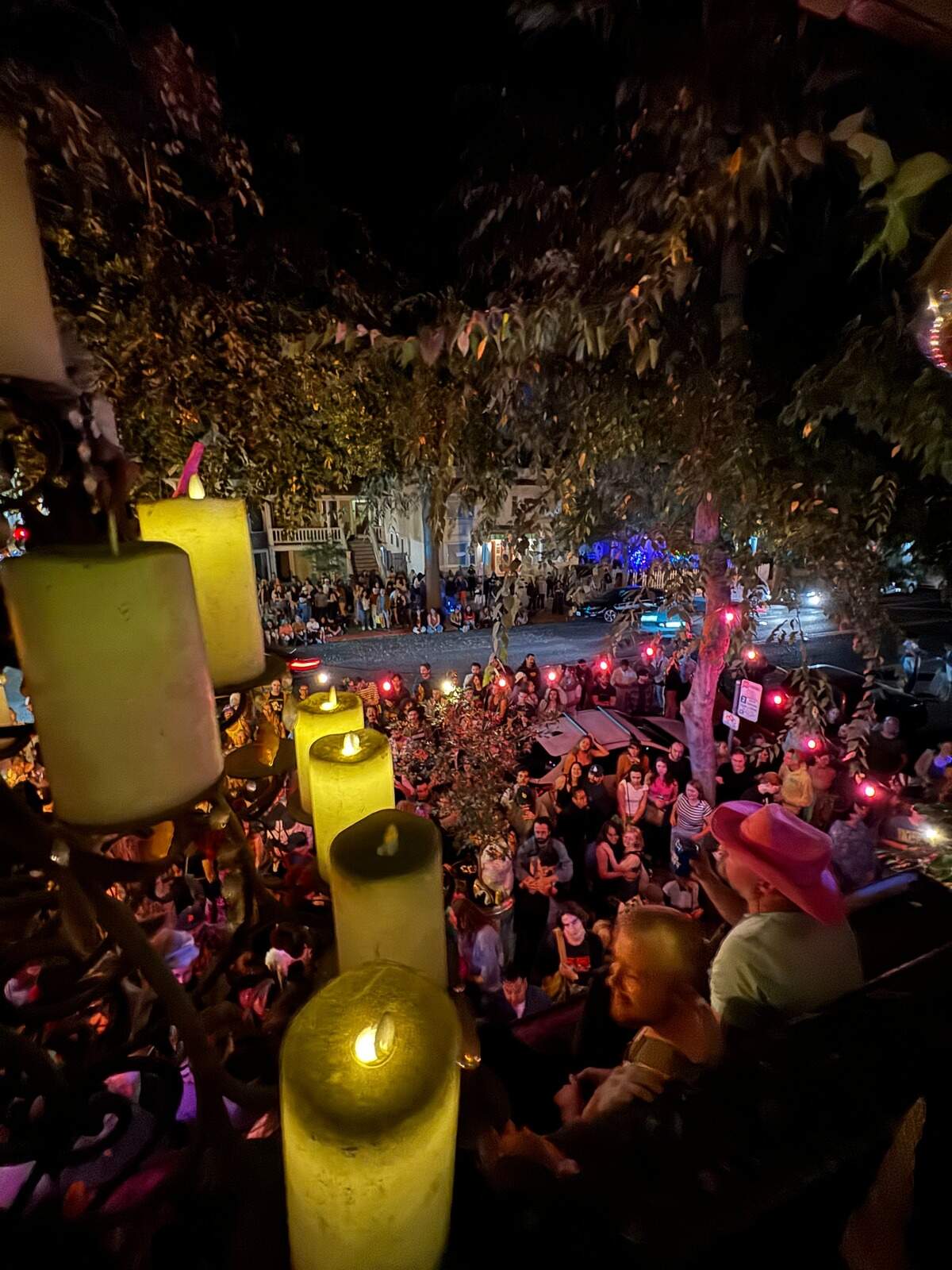 A view of the crowd from the porch of the Flop Haus, at the corner of 21st and I streets in Midtown Sacramento, during Sac Porchfest in 2024.