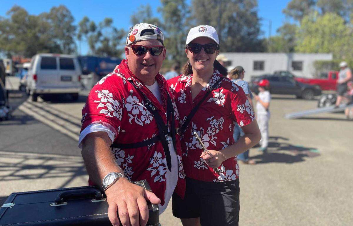 Don Kowall and Margot Dieu come together after their performance with the California Repercussions at the California State Fair on Saturday, July 16, 2022.
