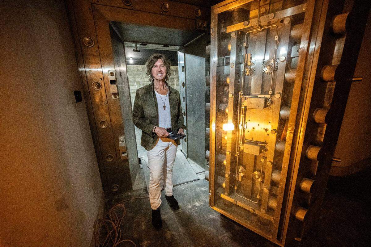 Developer Roger Hume stands in the vault of the Capital National Bank Building, which he is converting into a five-star hotel, on Wednesday.