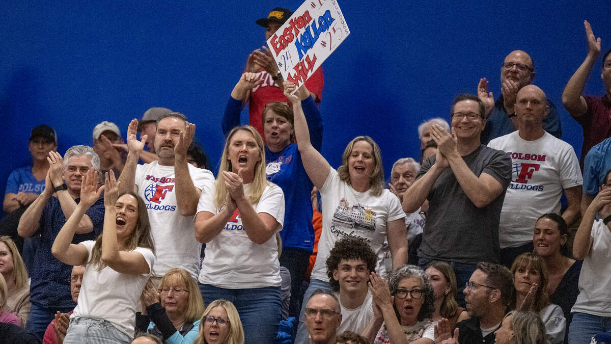 The Folsom Bulldogs' faithful cheer after a defensive stop in the second half in the CIF Northern California Regional Division I boys basketball championship against the Kings Academy Knights on Tuesday in Folsom. The Bulldogs will play for the CIF State title on Friday at Golden 1 Center.