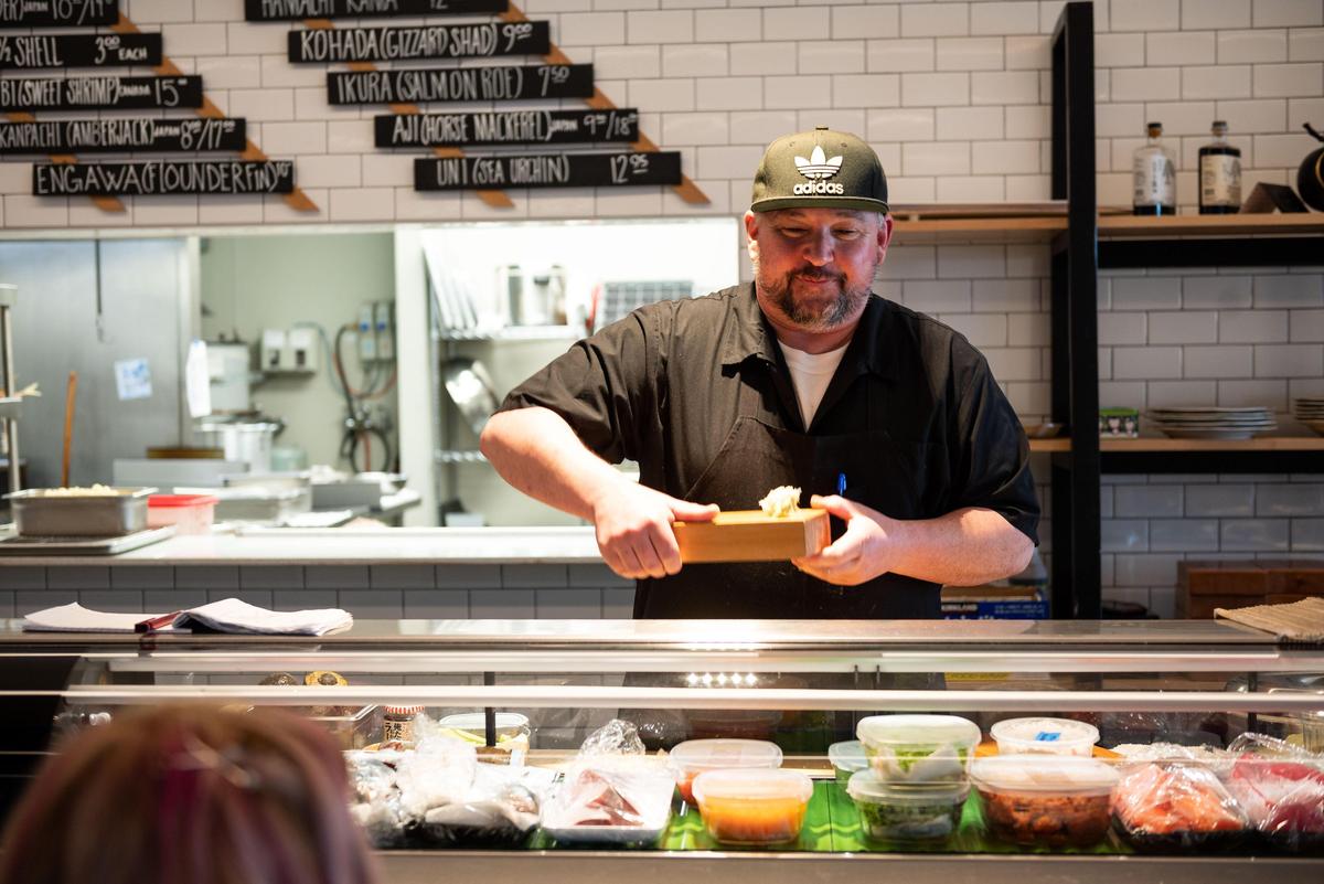 Southpaw Sushi chef Lou Valente sets up wasabi and pickled ginger for regulars David and Michelle Ott, of Natomas, at the restaurant on Del Paso Boulevard in North Sacramento on Feb. 13, 2020.
