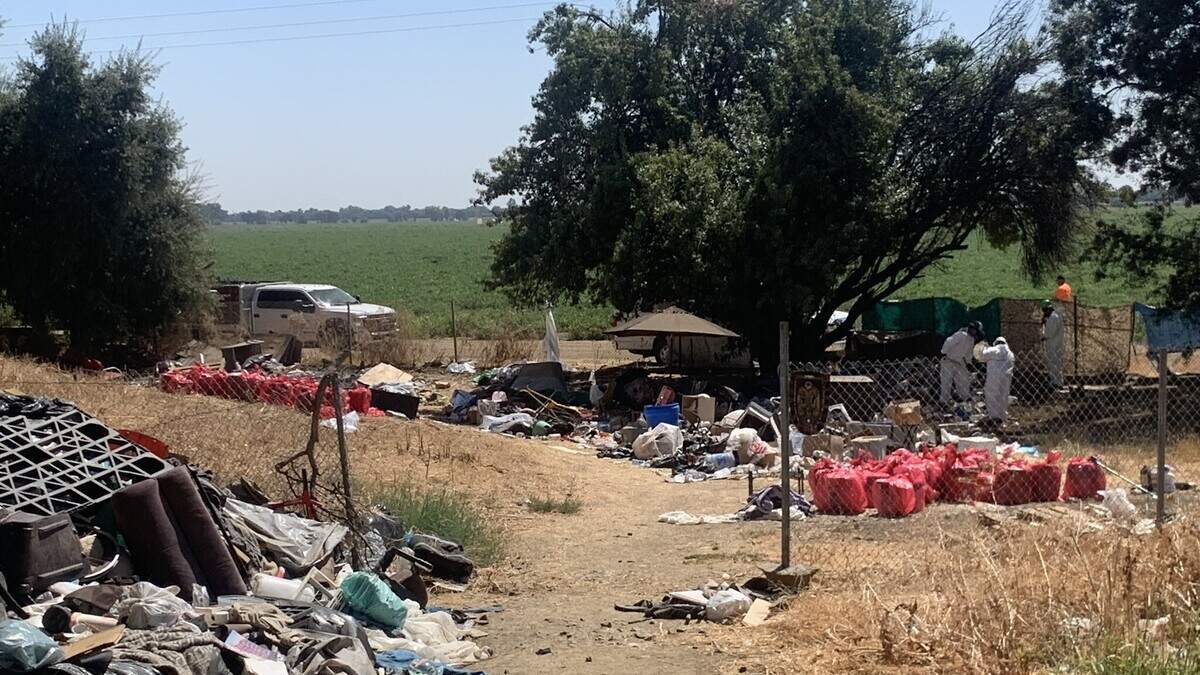 Solano County deputies and other law enforcement officials clear out a homeless encampment near Davis in an undated photo. The Solano County Sheriff’s Office said on Sept. 6, 2023, that the camp was determined to be a public health hazard.