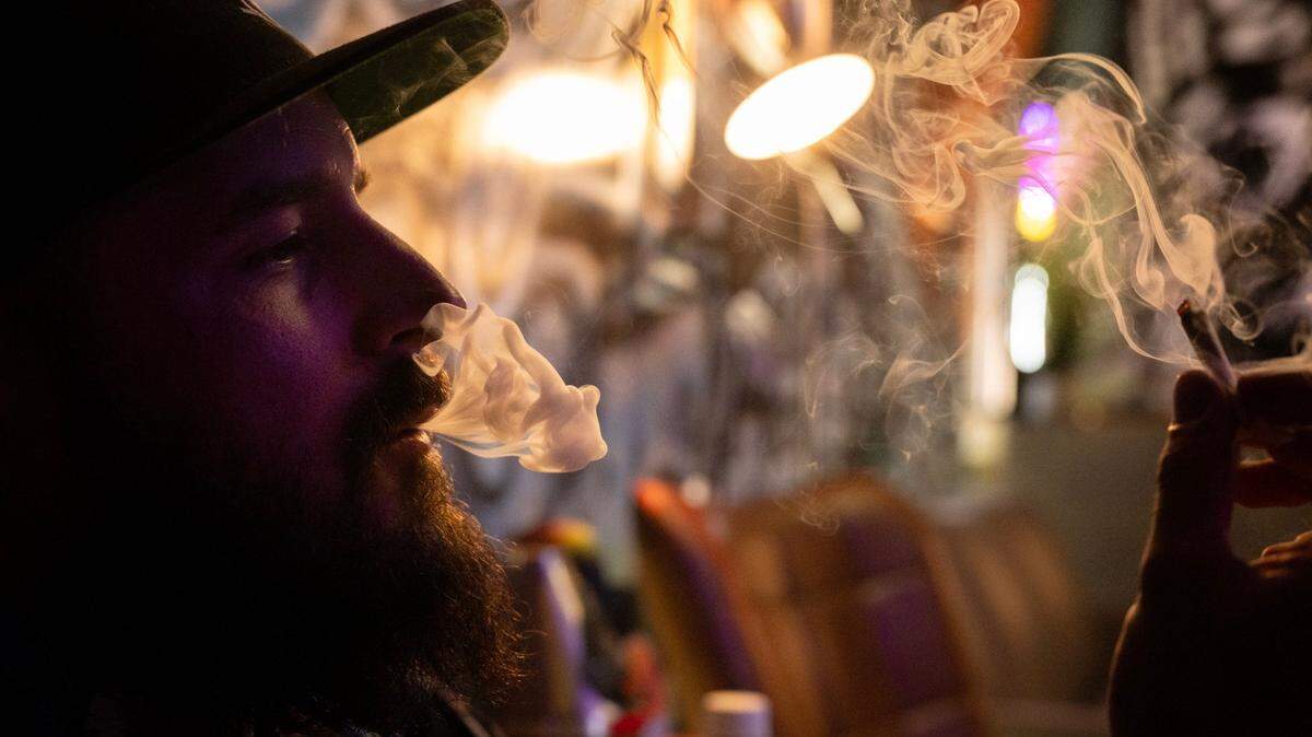 Customer Vince Purdue smokes cannabis in the Delta Boyz dispensary and consumption lounge in Isleton on Friday, May 24, 2024. Delta Boys has the only cannabis consumption lounge in Sacramento County.