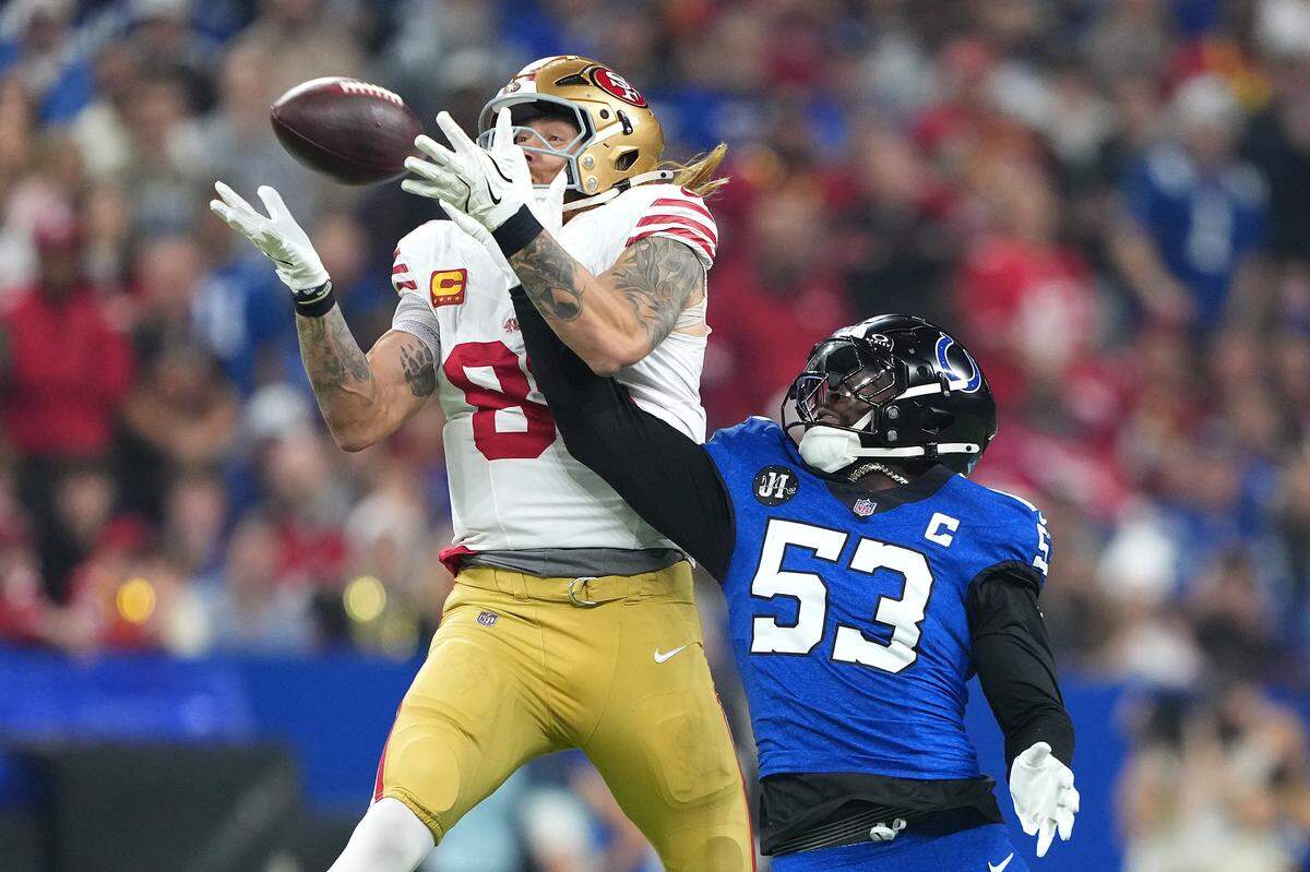 INDIANAPOLIS, INDIANA - DECEMBER 22: George Kittle #85 of the San Francisco 49ers makes a catch against Germaine Pratt #53 of the Indianapolis Colts during the first quarter of the game at Lucas Oil Stadium on December 22, 2025 in Indianapolis, Indiana. (Photo by Dylan Buell/Getty Images)