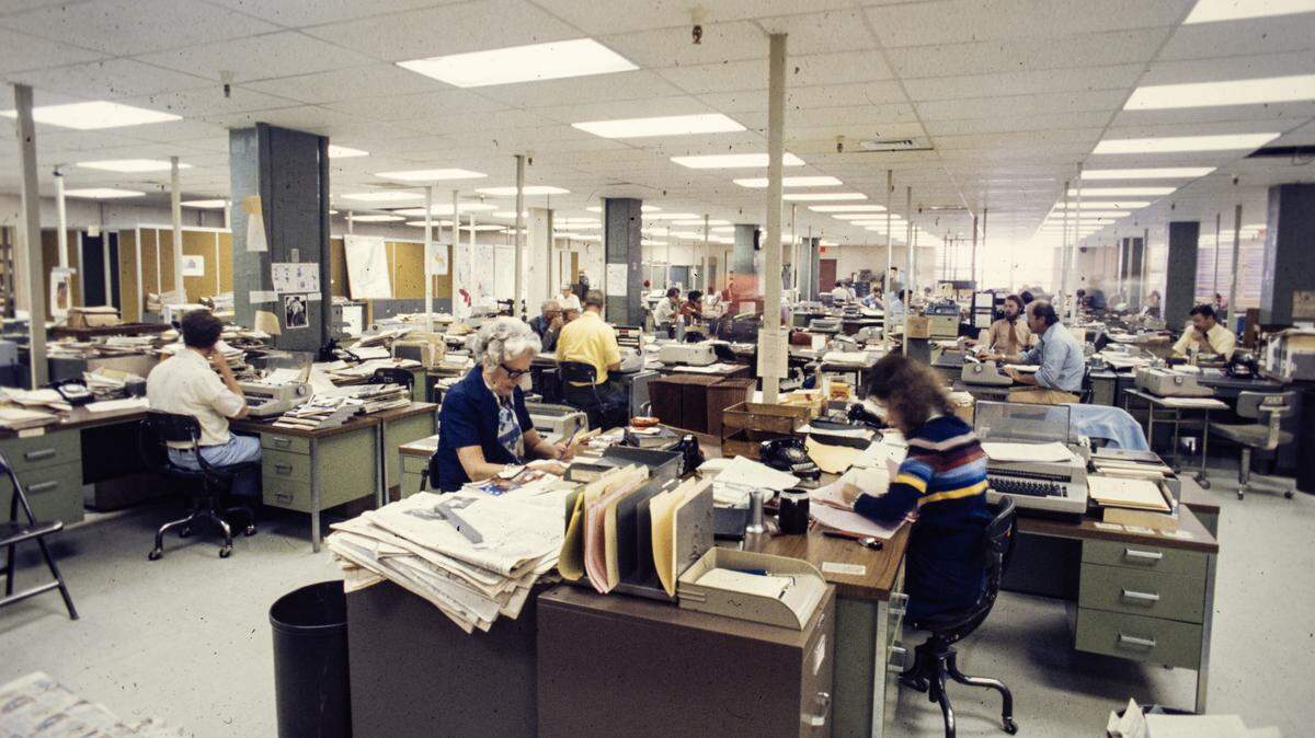 Staffers work in The Sacramento Bee newsoom on Q Street in 1976.
