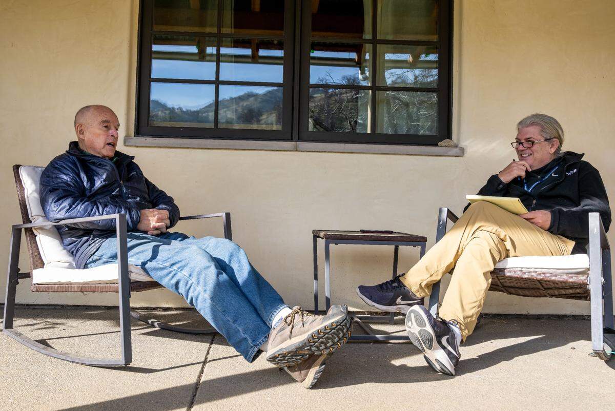 The Sacramento Bee’s Jack Ohman, right, interviews former Gov. Jerry Brown — and gives him a Latin pop quiz — during December visit to his ranch in Colusa County.