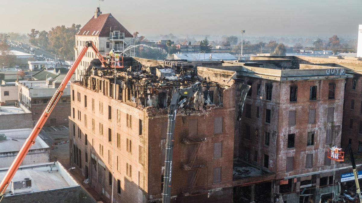Workers tear down the Hotel Marysville on Wednesday, Dec. 11, 2024. More than eight months after demolition completed, city officials are hosting a town hall to discuss the future of the downtown lot. 