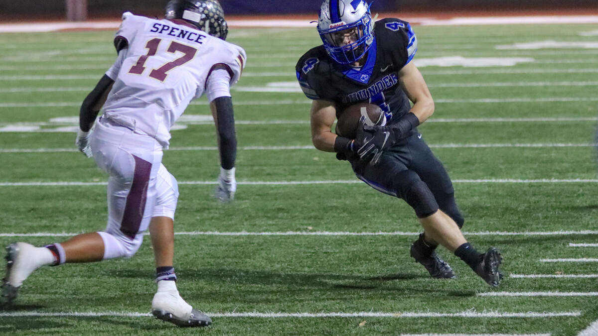 Rocklin’s Toran O’Harran runs with the ball against Whitney in a Sac-Joaquin Section playoff game last November.