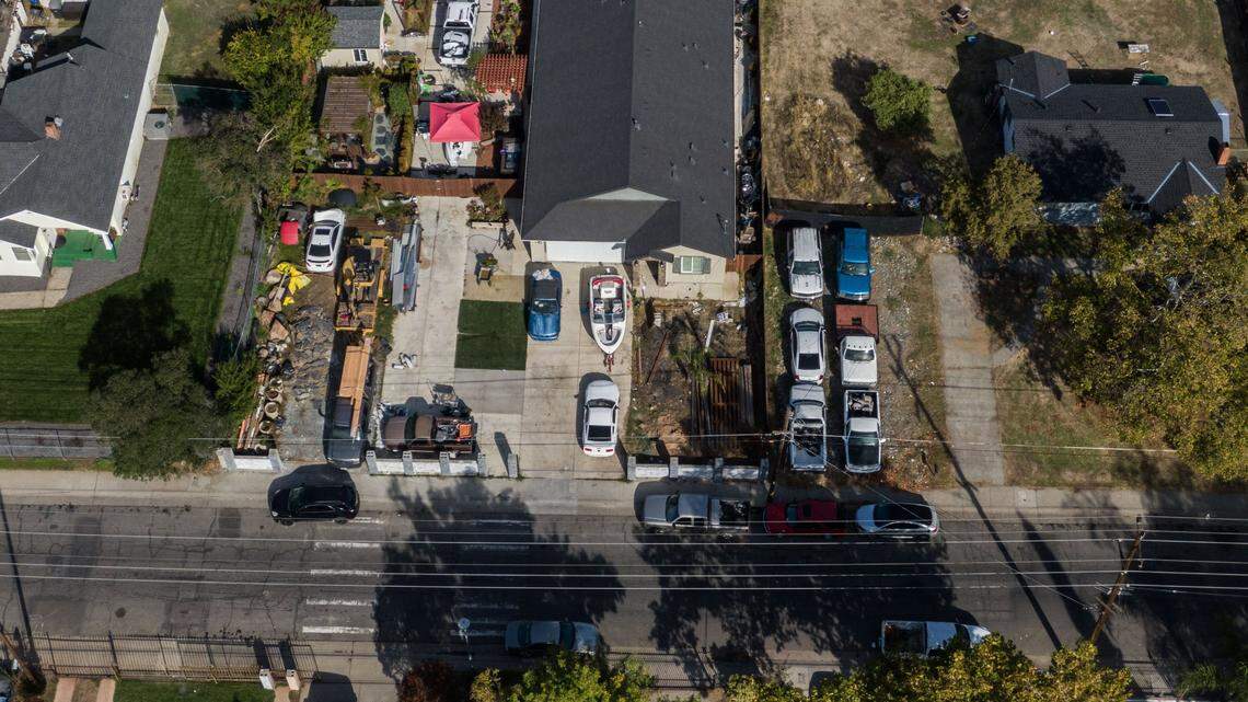A number of vehicles are parked on or next to Sacramento City Councilman Sean Loloee’s home in Hagginwood on Wednesday, Nov. 1, 2023.