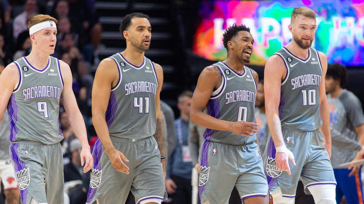 Sacramento Kings guard Kevin Huerter (9, Sacramento Kings forward Trey Lyles (41),Sacramento Kings guard Malik Monk (0) and Sacramento Kings forward Domantas Sabonis (10) walk to the bench during a timeout in the third quarter during a game at Golden 1 Center in Sacramento, Thursday, March 9, 2023.