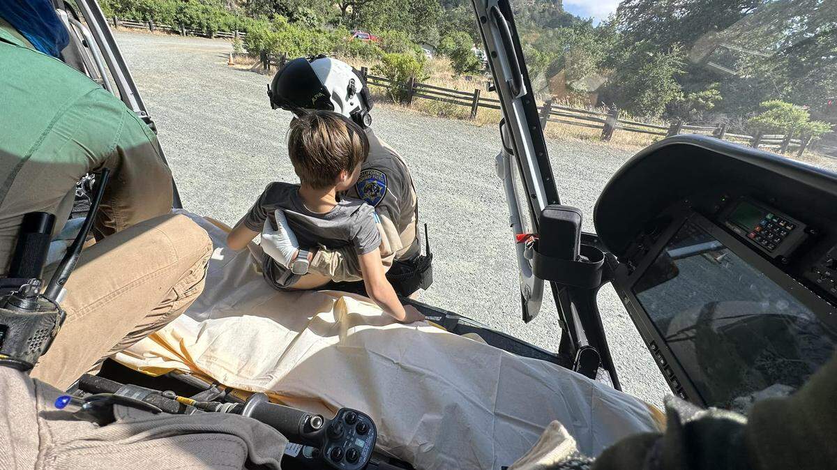 A 7-year-old boy was airlifted to a hospital after being bitten by a rattle snake, CA officials said.