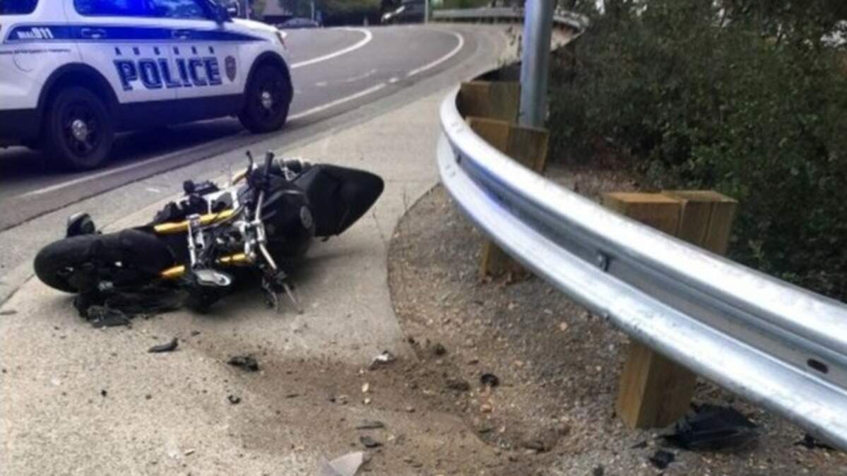 A motorcyclist suspected of driving under the influence of alcohol after leaving the Gold Country Fair crashed near Auburn Folsom Road and College Way on Saturday, September 10, 2022, in Auburn, California. Police said they located a loaded gun on the rider’s person.