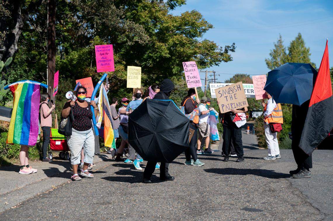 LGBTQ activists counter-protested a parents’ rights “War on Children” rally near Gov. Gavin Newsom’s home in Fair Oaks on Saturday.