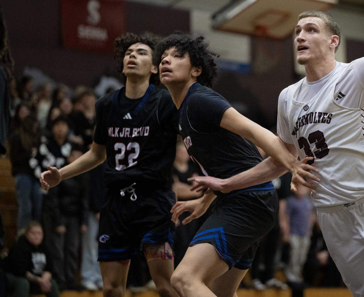 The Christian Brothers Falcons' Jaden DeJesus-Eves, center, gets into position during a boys basketball game against Woodcreek on Jan. 8 in Roseville. DeJesus-Eves, 14, died this week in his sleep, school officials said.