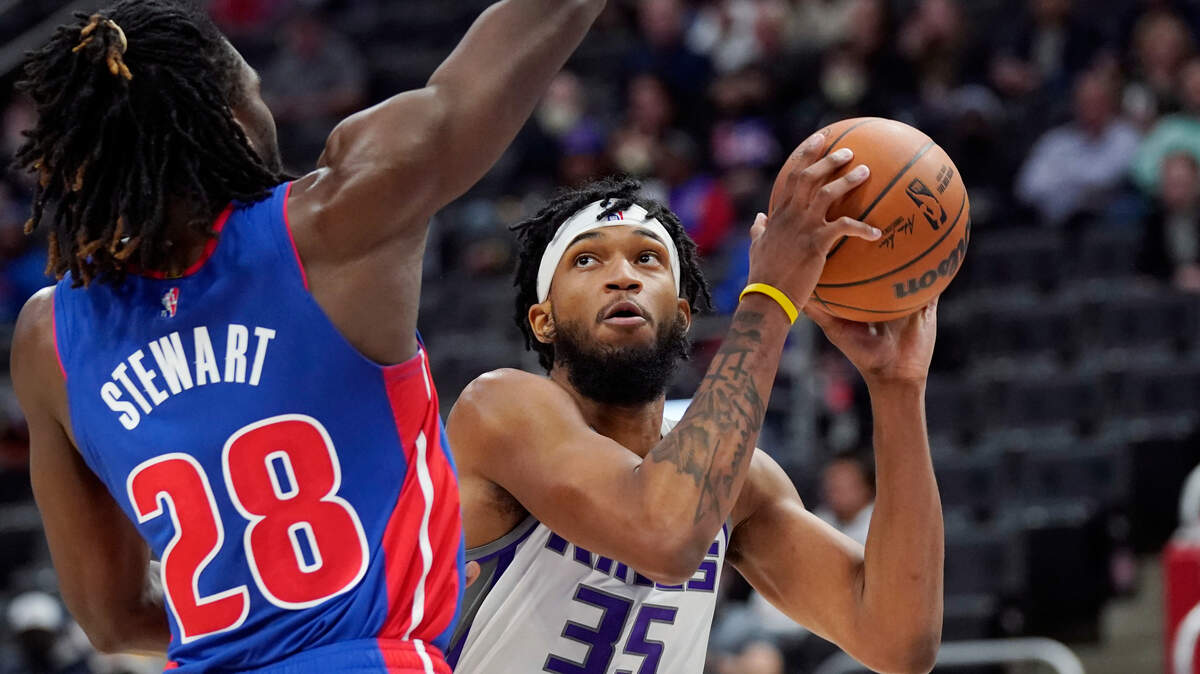 Sacramento Kings forward Marvin Bagley III (35) is defended by Detroit Pistons center Isaiah Stewart (28) during the first half of an NBA basketball game, Monday, Nov. 15, 2021, in Detroit. (AP Photo/Carlos Osorio)