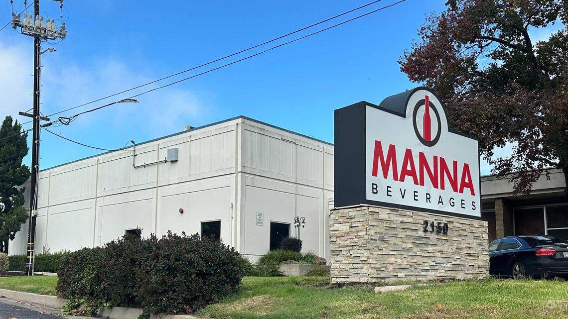 The exterior of the idled Manna Beverages plant is seen on Stone Boulevard in West Sacramento on Friday, Nov. 14, 2025. The facility, which employed 378 workers before shutting down in October, was acquired Wednesday by Redwood Beverage Group, whose executives say they plan to reopen the plant and rehire as many former employees as possible.