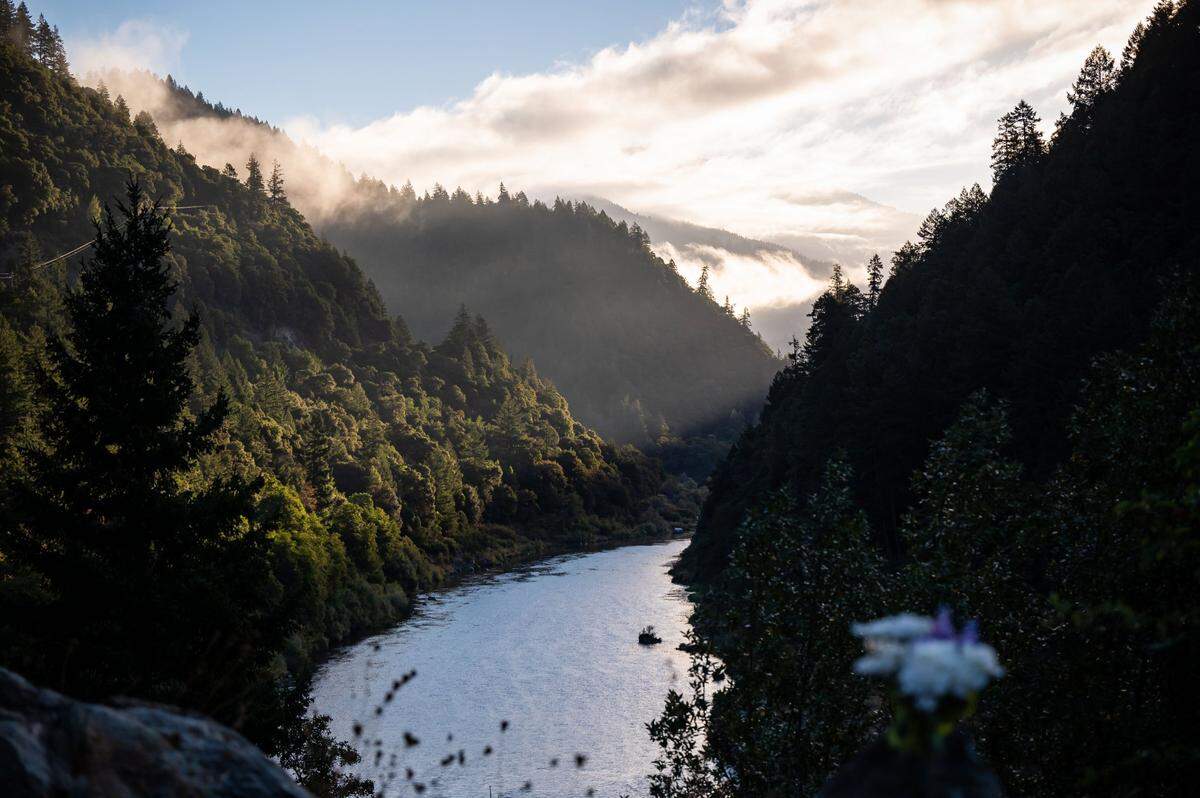 The morning sun inches towards the Klamath River, seen from Highway 96 near the border of Humboldt and Siskiyou counties in late September.
