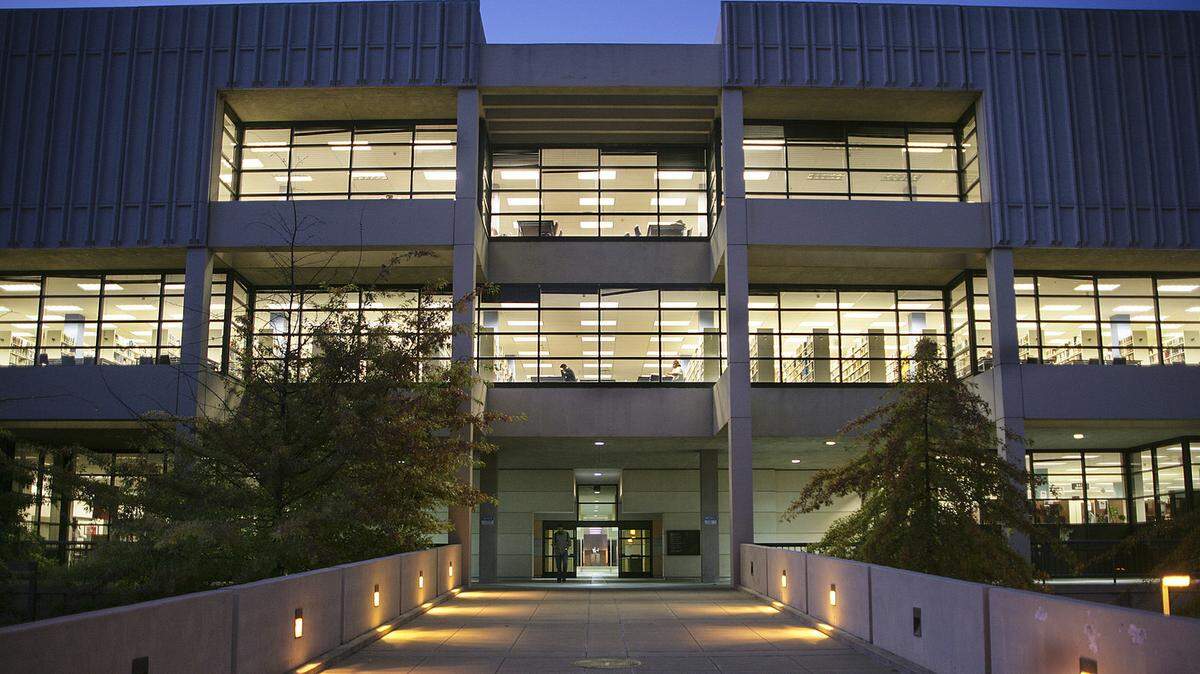 The Sacramento State library at night.