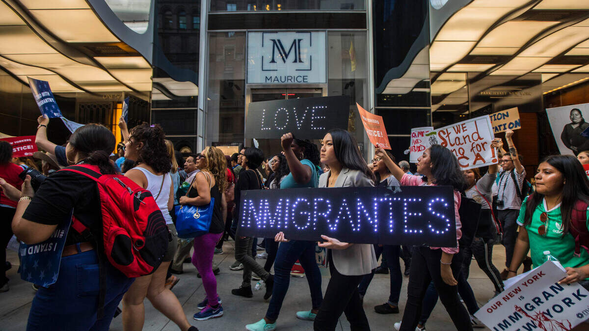 FILE -- Demonstrators march in support of the Deferred Action for Childhood Arrivals, or DACA, program, in New York, Aug. 30, 2017. The Supreme Court will decide whether the Trump administration may shut down the program that shields some 800,000 young, undocumented immigrants from deportation, the court said in June 2019. (Hiroko Masuike/The New York Times)