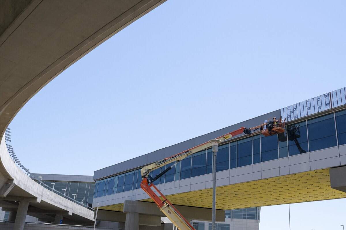 Construction continues on the new pedestrian walkway at Sacramento International Airport on Wednesday, June 17.