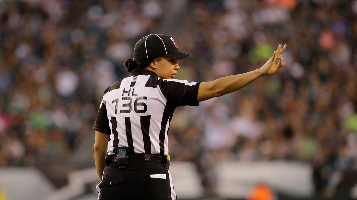 Head linesman Maia Chaka works a preseason game between the Philadelphia Eagles and the Baltimore Ravens in 2015.