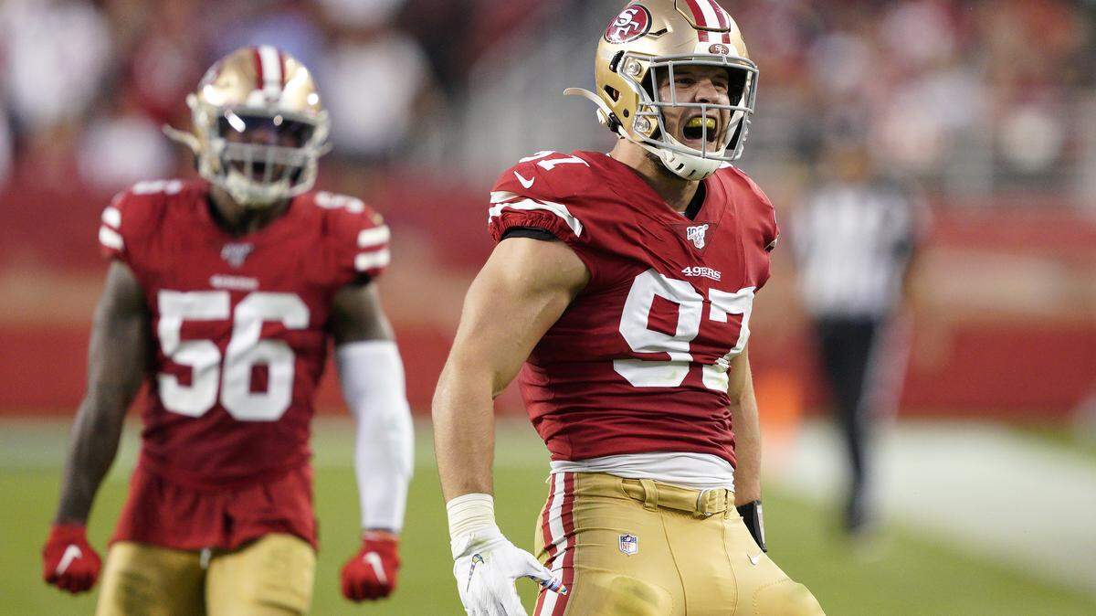 San Francisco 49ers defensive end Nick Bosa (97) celebrates in front of middle linebacker Kwon Alexander (56) during the first half of an NFL football game against the Cleveland Browns in Santa Clara, Calif., Monday, Oct. 7, 2019. (AP Photo/Tony Avelar)
