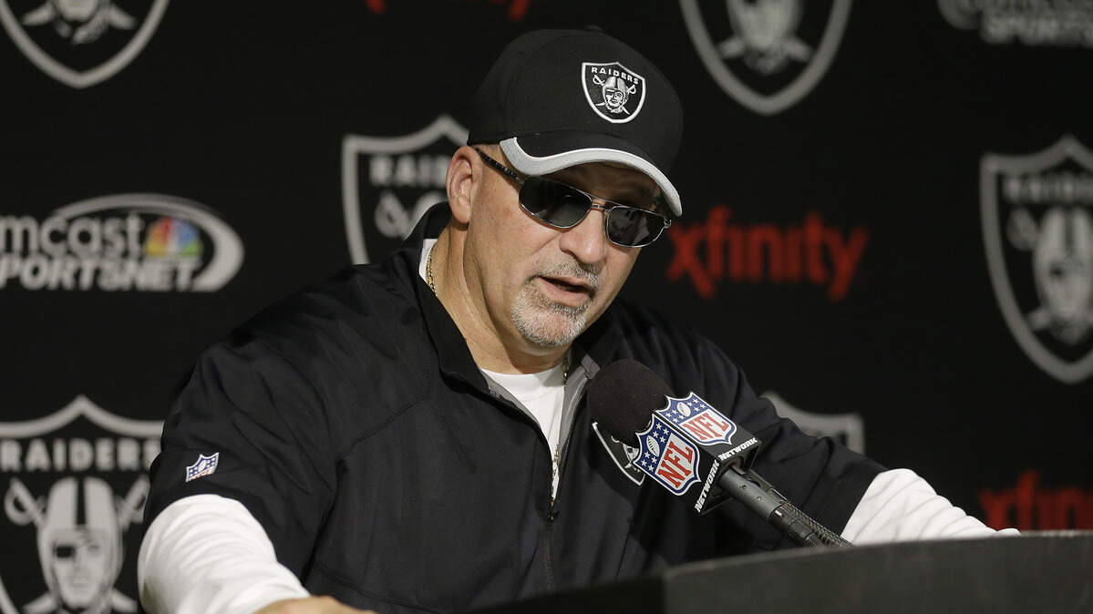 Raiders interim head coach Tony Sparano speaks after a victory over the Buffalo Bills on Dec. 21, 2014, in Oakland. The Minnesota Vikings said the team's offensive line coach died Sunday, but did not give a cause of death.