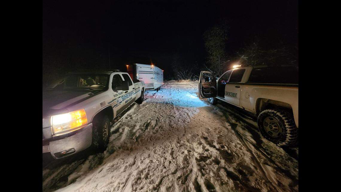 Two snowmobilers hunkered down for a night in the frigid wilderness after they got lost in dense fog, Utah rescuers said.