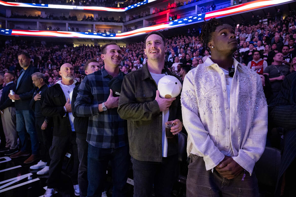 A’s manager Mark Kotsay and players JP Sears, JJ Bleday, Brent Rooker and Lawrence Butler stand for the national anthem at Golden 1 Center on Monday night.