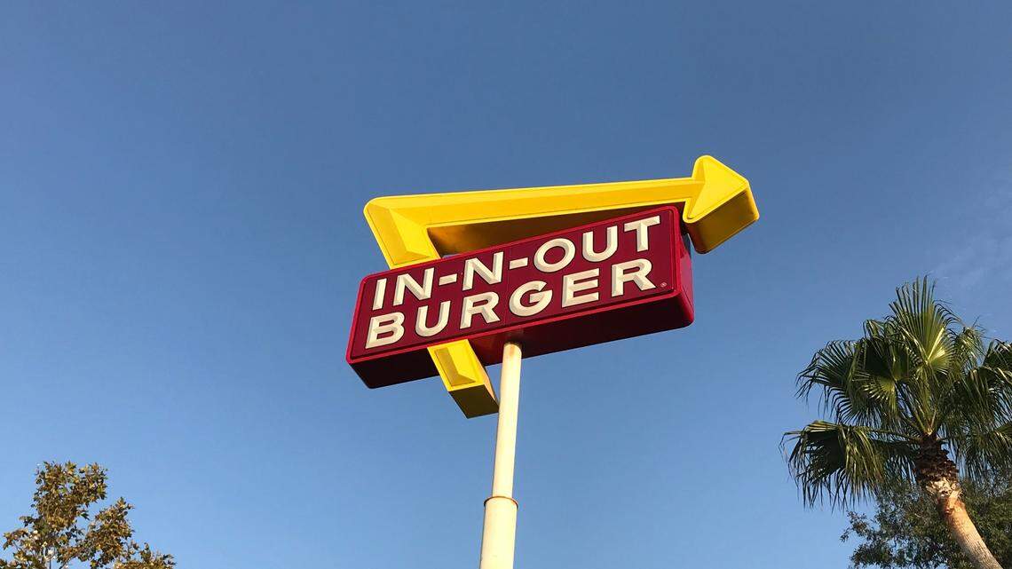 How much did a cheeseburger cost at In-N-Out when it first opened in California?