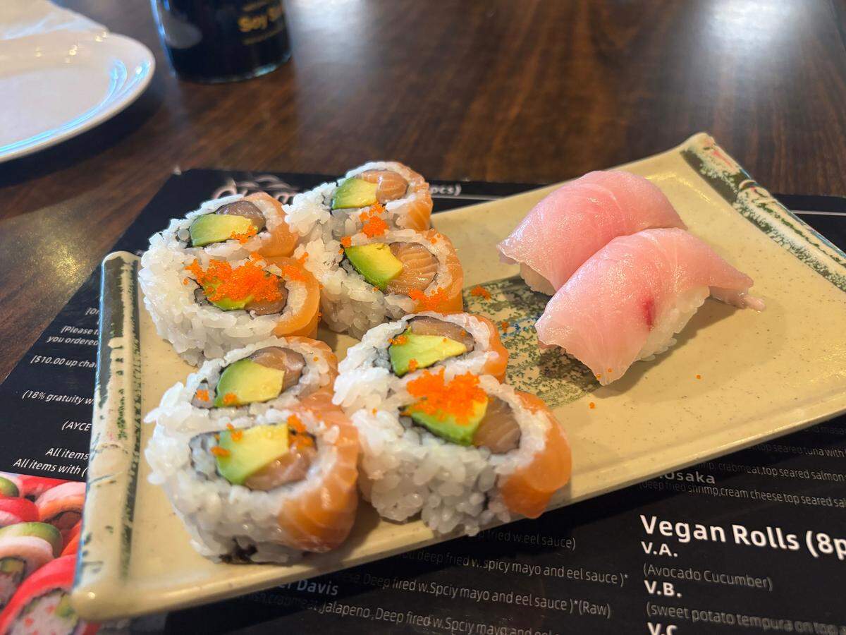 A Salmon Lover roll and two pieces of yellowtail nigiri at Nami Sushi in Davis. Two rolls and two orders of nigiri could be enough to render the all-you-can-eat price more cost-effective than the restaurant’s a la carte pricing.