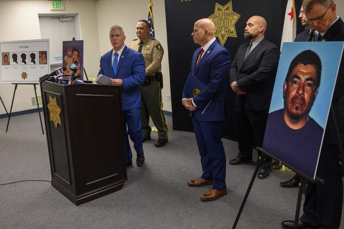Yolo County District Attorney Jeff Reisig steps up to the podium during a press conference at the Yolo County Sheriff’s office on Monday, Jan. 27, 2020 in Woodland to discuss the cold case arrest of Paul Allen Perez, 57, pictured at right, of Delano, who was placed under arrest for the individual murders of five of his children. 