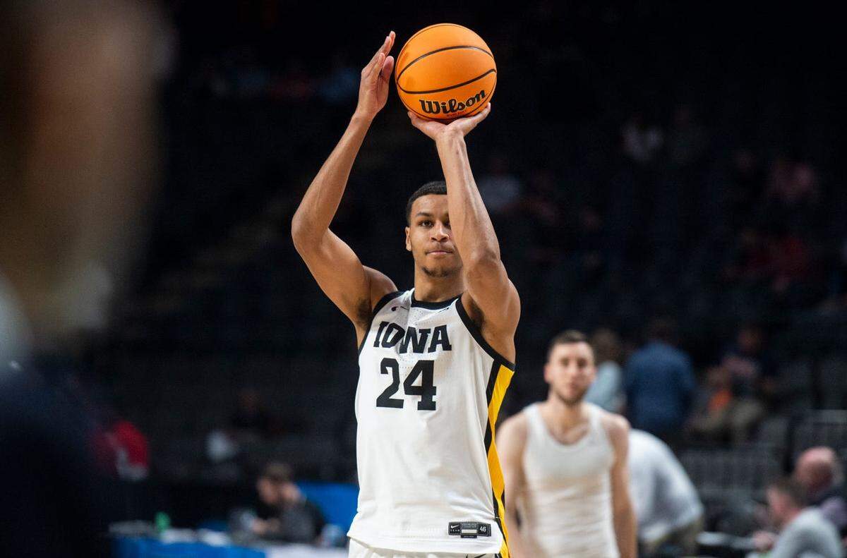 Iowa Hawkeyes forward Kris Murray (24) takes a jump shot during warm ups before Auburn Tigers take on Iowa Hawkeyes the first round of NCAA Tournament at Legacy Arena in Birmingham, Alabama, on Thursday, March 16, 2023.