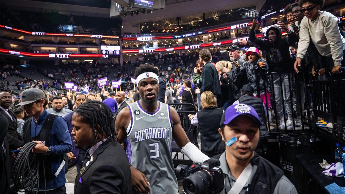 Sacramento Kings guard Terence Davis (3) heads to the locker room as fans cheer him after their 153-121 win over the Brooklyn Nets at the NBA basketball game Tuesday, Nov. 15, 2022, at Golden 1 Center in Sacramento.