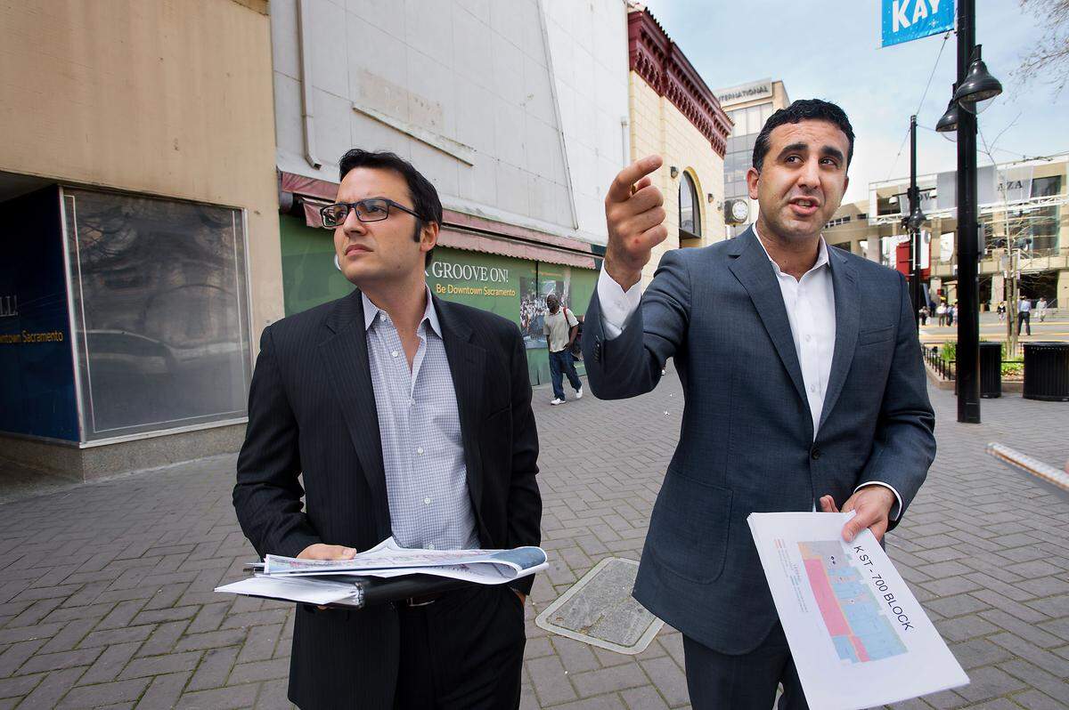 Developers Ali Youssefi, left, and Bay Miry walk the 700 block of K Street in Sacramento in 2013.