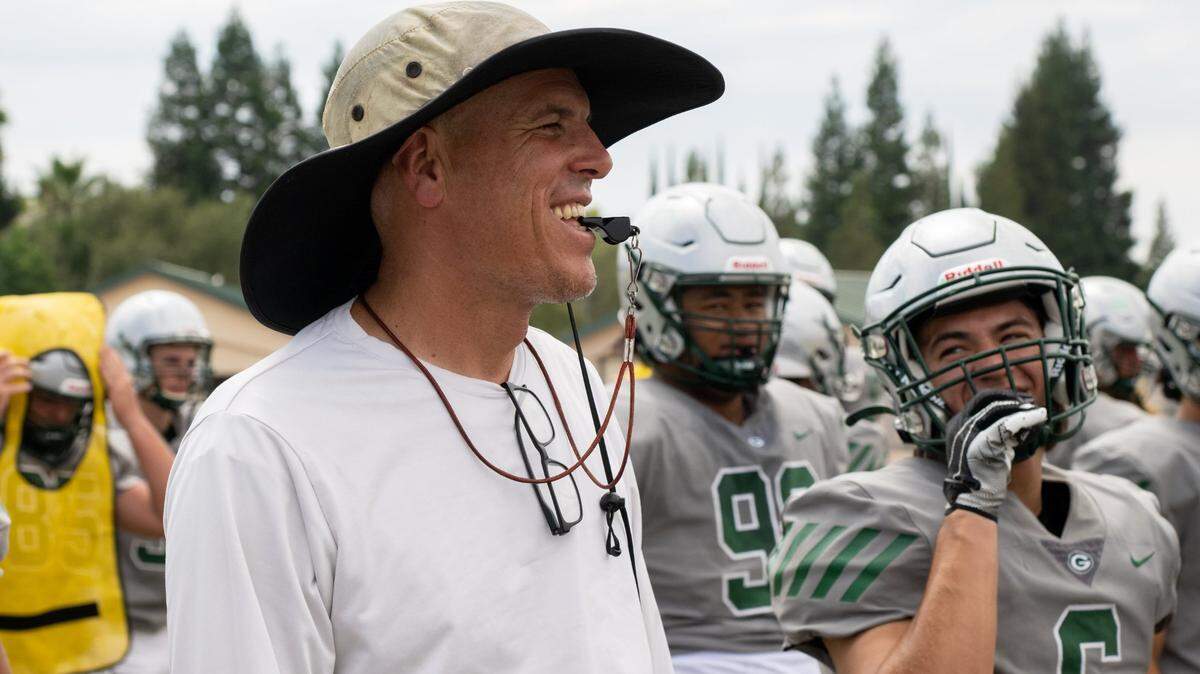 Granite Bay coach Joe Cattolico watches his players during a practice at the Granite Bay High School in Granite Bay, Wednesday, Aug. 17, 2022.
