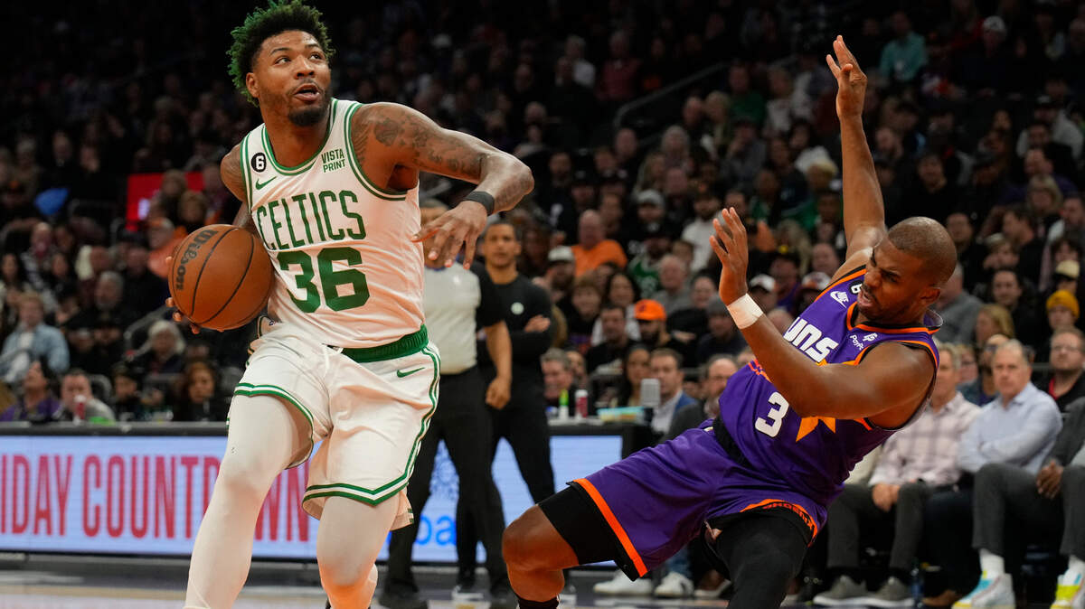 Boston Celtics guard Marcus Smart (36) during the first half of an NBA basketball game against the Phoenix Suns, Wednesday, Dec. 7, 2022, in Phoenix. (AP Photo/Rick Scuteri)