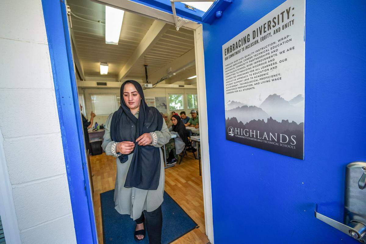 Khalida Omar, 31, who grew up in Pakistan and married an Afghan SIV holder and lived in Afghanistan, leaves the classroom at Highlands Community Charter School’s Edison Avenue campus in Arden Arcade last month. She said – through an interpreter – that her hopes of entering the medical profession were rekindled after enrolling: “I felt like I was reborn.”