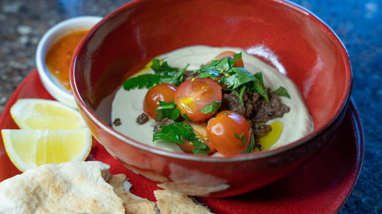 Hummus Bowls with Spiced Ground Beef and Tomatoes can be made with a trip to your pantry