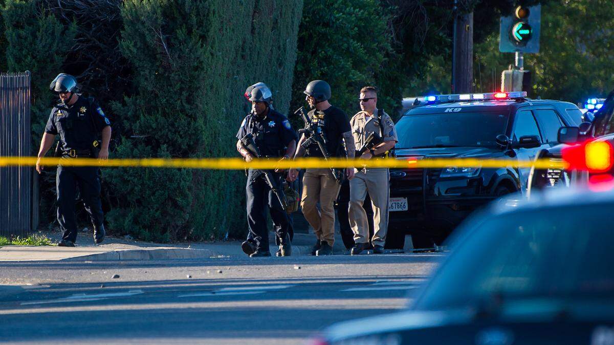 Sacramento Police officers respond to a shooting on Redwood Avenue on Wednesday, June 19, 2019 in Sacramento.