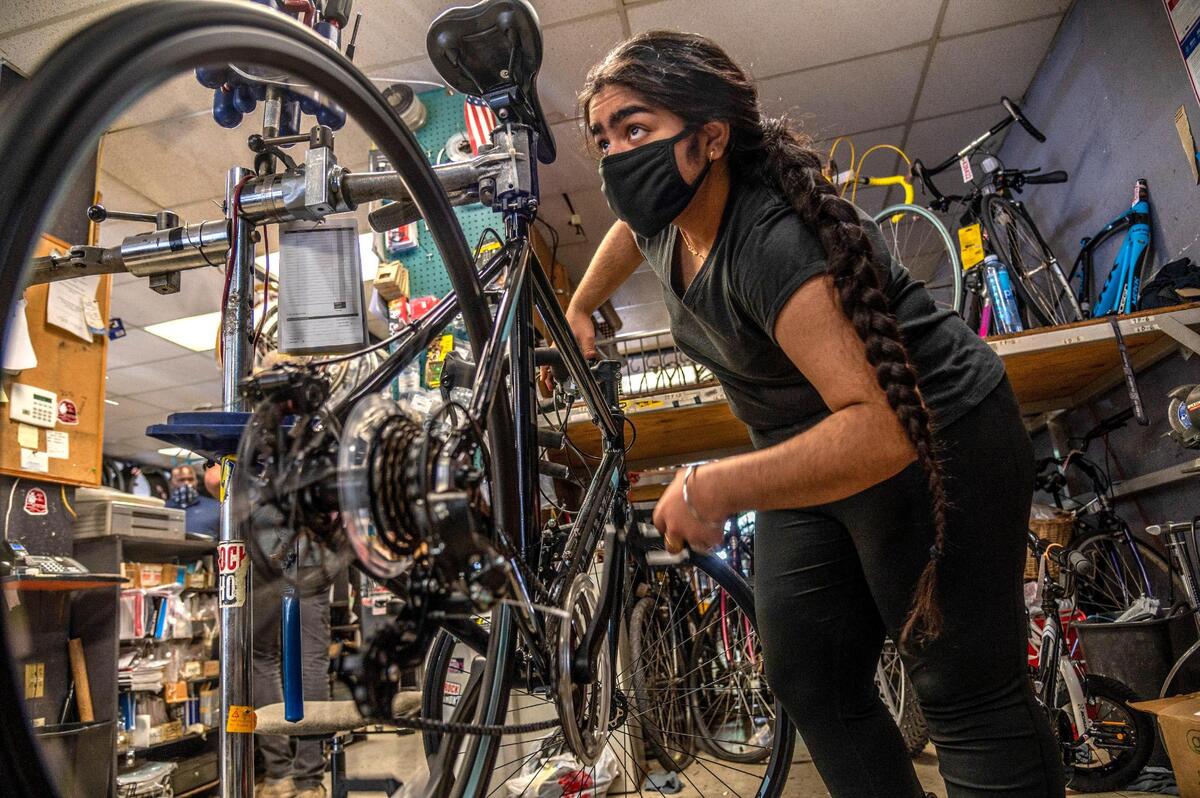 22. Evrinpreet Kaur, 18, who was born in Punjab, India works as the first female bicycle mechanic at the Natomas Bike Shop in Sacramento on Monday, Sept. 28, 2020. She said COVID educational restrictions and cultural differences didn’t stop her from learning. “All females are not into this kind of work. There are some girls who care about their hands and they don’t want to destroy their hands,” she said.