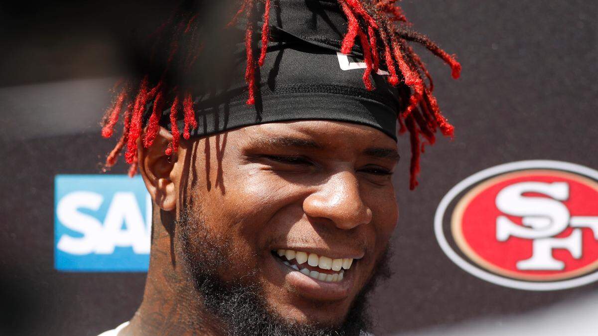 San Francisco linebacker Kwon Alexander jokes with reporters Friday. The veteran has led a fiery group of linebackers through training camp.