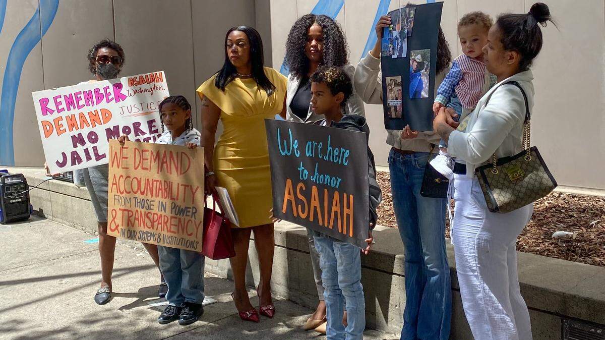 The family of Asaiah Washington, who died in the Sacramento County Main Jail in 2024, gather outside the jail on Thursday, May 28, 2026, to raise awareness about his death.