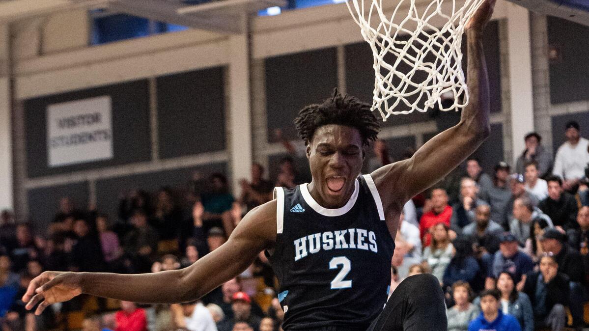 Sheldon’s Xavion Brown completes an alley-oop dunk off an assist from Josh Williams in the first period against Dublin during the high school boys basketball CIF NorCal Open Division semifinal Tuesday, March 10, 2020, at Dublin High School.