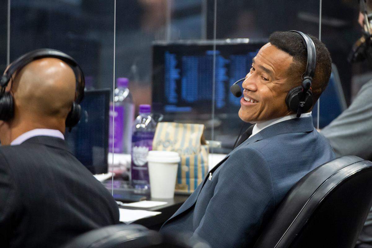 New Kings play-by-play announcer Mark Jones talks to Doug Christie during a preseason game at Golden 1 Center on Tuesday, Dec 15, 2020 in Sacramento. 