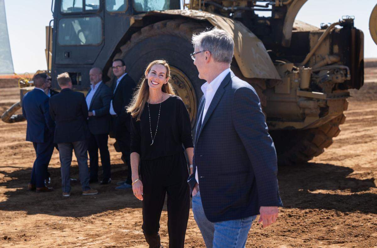 Somers West Chief Operating Officer Rachel Bardis and owner Charles Somers share a smile during the ground breaking of Braden on Thursday.